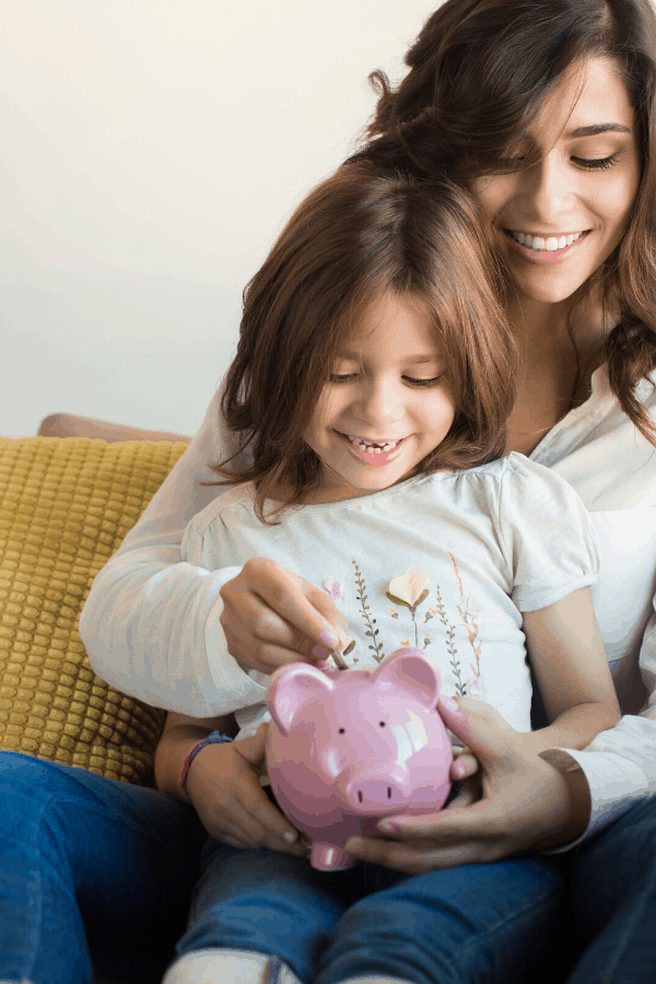 mother and child saving money