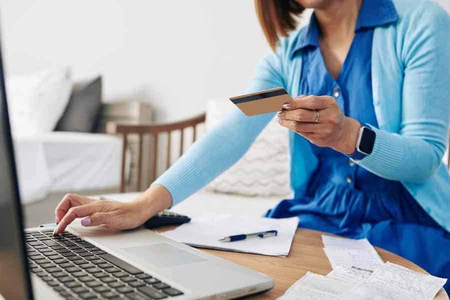 woman paying bills online