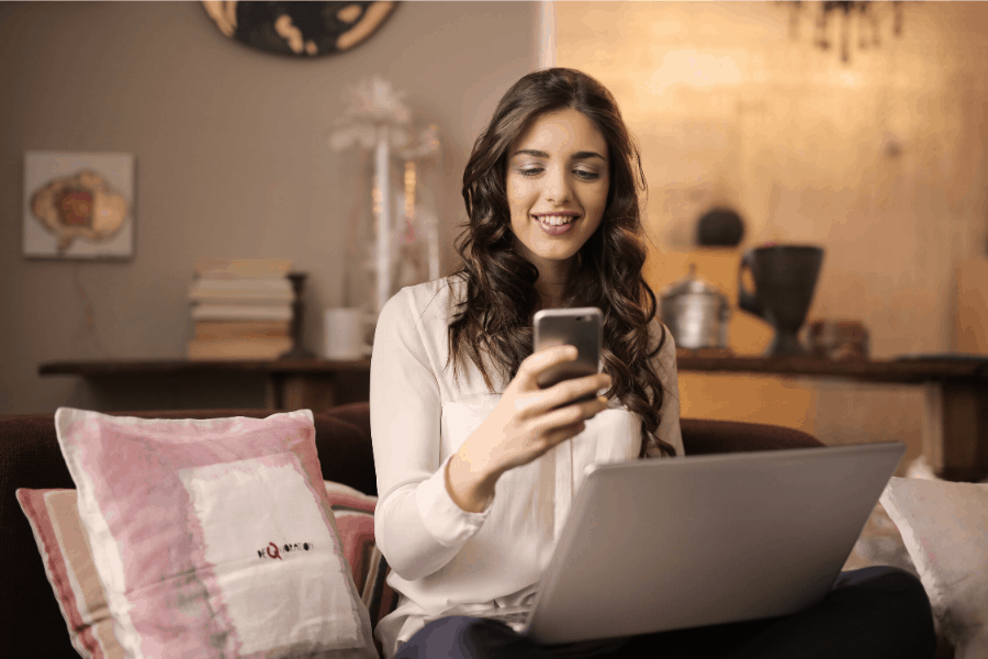 woman taking surveys on her phone