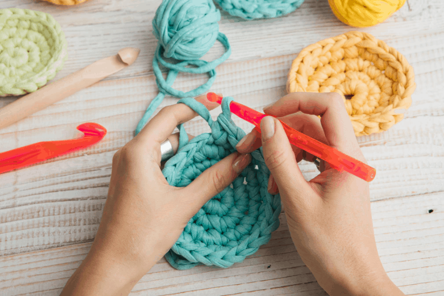 woman crocheting crafts