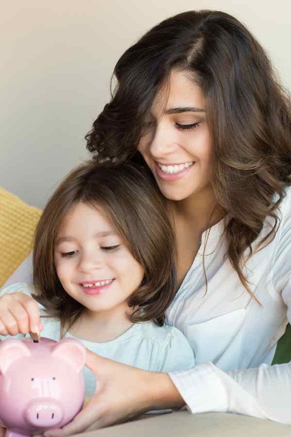 single mom counting money with her child