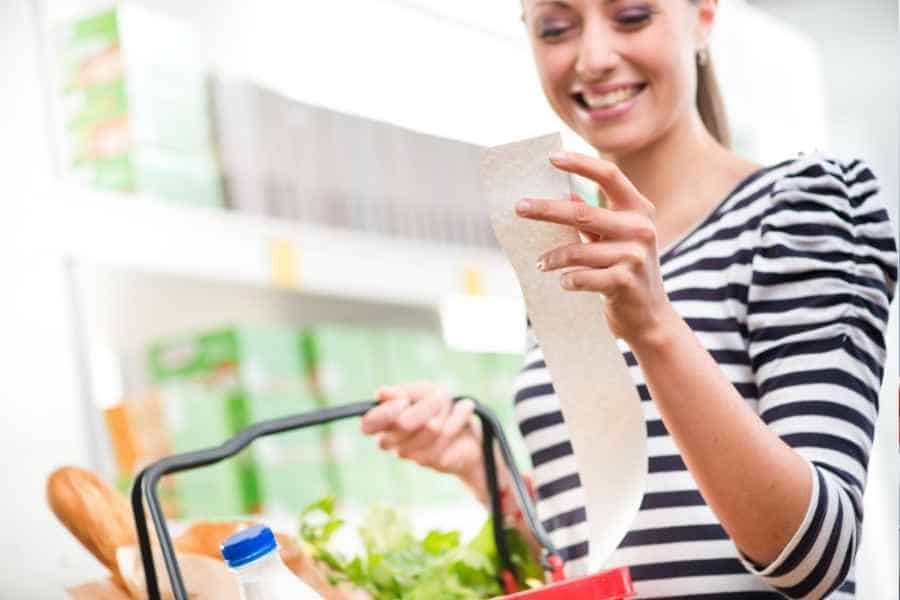 woman saving money on groceries