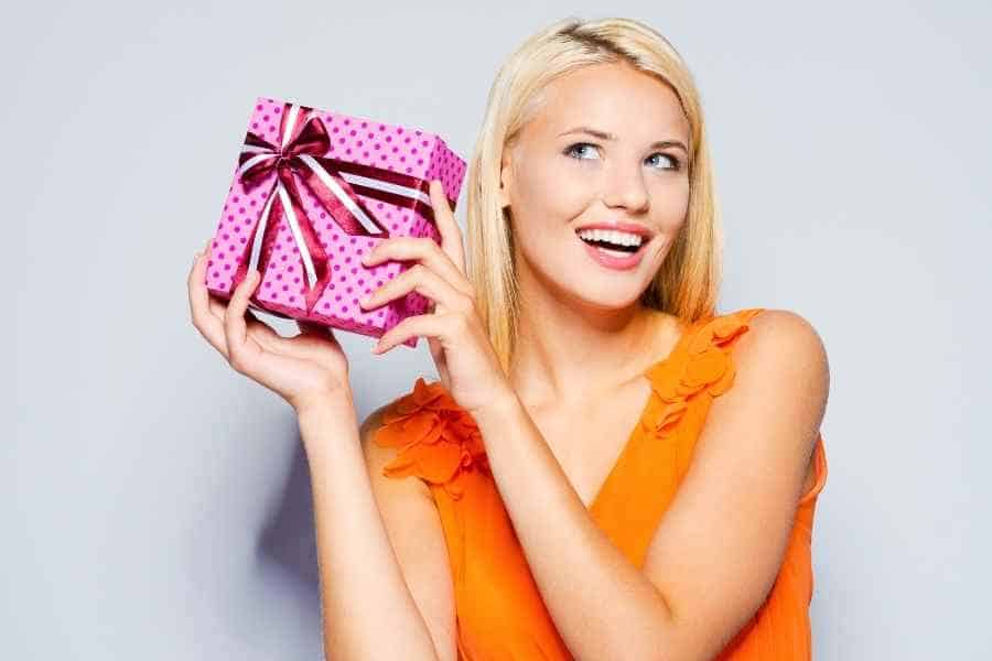 woman holding a gift