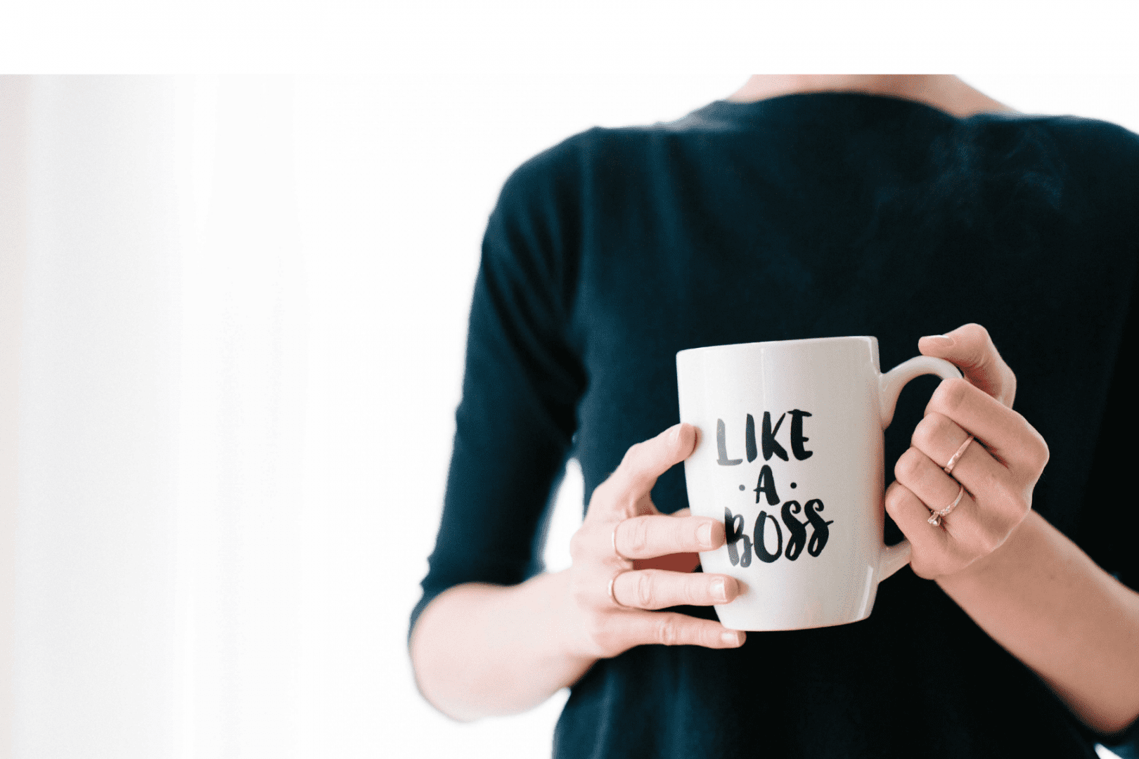 woman holding a coffee cup