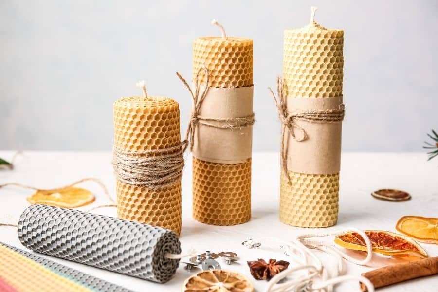 a collection of homemade beeswax candles for sale