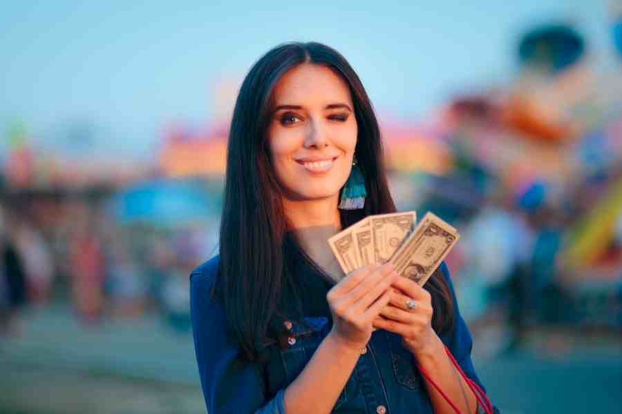 woman holding cash