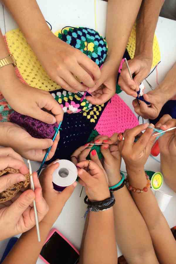 teenagers knitting items to sell on etsy