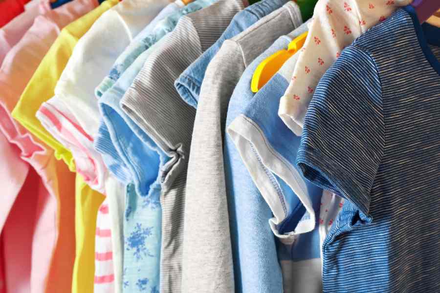 rack of kids clothes for sale